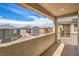 Relaxing outdoor view from balcony overlooking neighborhood rooftops at 415 Carsin Wayne Ct, North Las Vegas, NV 89031