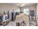 Carpeted bedroom with large window and ceiling fan at 415 Carsin Wayne Ct, North Las Vegas, NV 89031