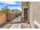 Gated entrance to the front door of the home with brick-paved walkway at 415 Carsin Wayne Ct, North Las Vegas, NV 89031