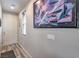 Inviting entryway featuring modern decor, light gray walls, and wood-look flooring at 415 Carsin Wayne Ct, North Las Vegas, NV 89031