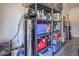 Organized garage storage with shelving units providing ample space for tools and equipment at 415 Carsin Wayne Ct, North Las Vegas, NV 89031