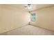 Neutral bedroom featuring carpet, a ceiling fan, and natural light from a window at 4197 Tolkien Ave, Las Vegas, NV 89115