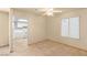 Bright dining room with tile flooring and a view into the kitchen at 4197 Tolkien Ave, Las Vegas, NV 89115
