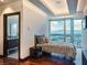 Bright bedroom boasts city views from floor-to-ceiling windows and ensuite bathroom access through an open doorway at 4471 Dean Martin Dr # 4308, Las Vegas, NV 89103