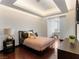 Cozy bedroom with tray ceilings, hardwood floors and city views at 4471 Dean Martin Dr # 4308, Las Vegas, NV 89103