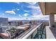 Sweeping city view from a balcony with a scenic highway and modern buildings set against a clear sky at 4471 Dean Martin Dr # 4308, Las Vegas, NV 89103