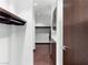 Walk-in closet with built-in storage and dark hardwood floors at 4471 Dean Martin Dr # 4308, Las Vegas, NV 89103