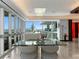 Bright dining area featuring a glass table, comfortable seating, and large windows with a city view at 4471 Dean Martin Dr # 4308, Las Vegas, NV 89103