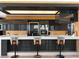 Modern kitchen with breakfast bar, designer lighting, and city views at 4471 Dean Martin Dr # 4308, Las Vegas, NV 89103