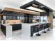 Stylish kitchen features a breakfast bar, stainless steel appliances, and ample counter space at 4471 Dean Martin Dr # 4308, Las Vegas, NV 89103