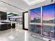 Modern living space featuring sleek black cabinetry, and incredible city views at 4471 Dean Martin Dr # 4308, Las Vegas, NV 89103
