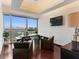 Home office space with large windows offering a city view, complemented by elegant desk and seating at 4471 Dean Martin Dr # 4308, Las Vegas, NV 89103