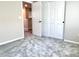 Cozy bedroom featuring neutral walls, plush carpet, and closet with double sliding doors at 5060 Serene Skies St, Las Vegas, NV 89130