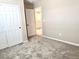 Neutral bedroom features a closet and carpet at 5060 Serene Skies St, Las Vegas, NV 89130