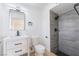Bathroom featuring modern vanity and tiled walk-in shower at 5069 Hallet Dr, Las Vegas, NV 89122