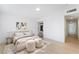 Staged bedroom showing ensuite bathroom and walk-in closet at 5069 Hallet Dr, Las Vegas, NV 89122