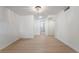Inviting bedroom features light wood floors and neutral walls, illuminated by recessed lighting at 5069 Hallet Dr, Las Vegas, NV 89122