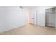 Empty bedroom featuring wood-look floors and a closet at 5069 Hallet Dr, Las Vegas, NV 89122