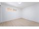 Empty bedroom featuring wood-look floors and a bright window at 5069 Hallet Dr, Las Vegas, NV 89122