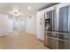 Spacious kitchen featuring stainless steel appliances and ample storage, blending functionality with style at 5069 Hallet Dr, Las Vegas, NV 89122