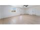 Well-lit living room showcases light wood floors, a window, and convenient access to storage at 5069 Hallet Dr, Las Vegas, NV 89122