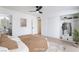 Stylish main bedroom features hardwood floors, a ceiling fan, and closet space at 5069 Hallet Dr, Las Vegas, NV 89122