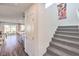 A view of the entryway, stairs, and an open concept living area at 5722 Sunset Sedona St # Lot 7, North Las Vegas, NV 89081