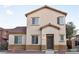 Charming two-story home with a well-maintained stucco exterior and inviting front entrance at 649 Ryan Peak Ln, Henderson, NV 89011
