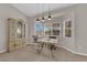 Features a charming breakfast nook with bright windows and modern light fixture at 6781 Alpine Brooks Ave, Las Vegas, NV 89130