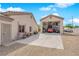 Large driveway leading to a spacious garage featuring a vehicle lift, offering ample parking and storage at 6781 Alpine Brooks Ave, Las Vegas, NV 89130