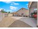 Wide driveway with a detached garage, and additional yard space, providing ample parking at 6781 Alpine Brooks Ave, Las Vegas, NV 89130
