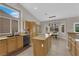 Featuring granite countertops, wood cabinets, stainless steel appliances, and recessed lighting at 6781 Alpine Brooks Ave, Las Vegas, NV 89130