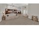 Spacious living room with an open design, neutral tones, and seamless connection to the home's interior at 6781 Alpine Brooks Ave, Las Vegas, NV 89130