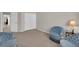 Comfortable living room with soft carpet, perfect for relaxing or entertaining friends at 6781 Alpine Brooks Ave, Las Vegas, NV 89130