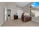 Bright office features a large window, desk, and tile flooring at 6781 Alpine Brooks Ave, Las Vegas, NV 89130