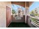 Cozy balcony with views of the community buildings and landscaping at 6857 Tamarus St # 202, Las Vegas, NV 89119