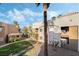 Apartment complex features stucco siding, tile roof and desert landscaping at 6857 Tamarus St # 202, Las Vegas, NV 89119