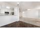 The open-concept living space flows to the kitchen with breakfast bar at 6857 Tamarus St # 202, Las Vegas, NV 89119