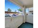 A view from the balcony overlooking a community parking area on a bright, sunny day at 698 S Racetrack Rd # 412, Henderson, NV 89015