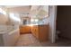 This is a well-lit bathroom with a soaking tub and ample vanity space at 7417 Red Eagle St, Las Vegas, NV 89131