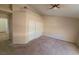 Spacious bedroom with carpeting, a ceiling fan, and closet storage at 7417 Red Eagle St, Las Vegas, NV 89131