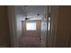 Carpeted bedroom with ceiling fan, neutral walls, and natural light from a large window at 7417 Red Eagle St, Las Vegas, NV 89131