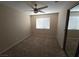 Cozy bedroom with carpeted floors and a mirrored closet at 7417 Red Eagle St, Las Vegas, NV 89131