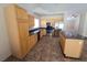 Open kitchen with stainless steel appliances, granite countertops, and wooden cabinets at 7417 Red Eagle St, Las Vegas, NV 89131