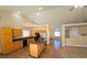 Open floor plan with a seamless transition from kitchen to living room, perfect for entertaining at 7417 Red Eagle St, Las Vegas, NV 89131