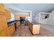 Well-equipped kitchen featuring stainless steel appliances, wooden cabinets, and a central island at 7417 Red Eagle St, Las Vegas, NV 89131