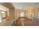 Bright living area with tile floors, high ceilings, and an open floor plan with neutral color palette at 7417 Red Eagle St, Las Vegas, NV 89131