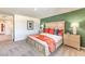 Inviting main bedroom with a neutral color scheme, comfortable bedding, and stylish furnishings at 7454 Bosco Brook Dr # Lot 48, North Las Vegas, NV 89084