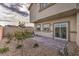 Enclosed backyard with a stone patio, gravel and partial synthetic grass for easy maintenance at 7915 Pandora Sky St # 402, Las Vegas, NV 89084