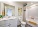 Clean bathroom featuring a vanity, toilet, shower and tub combination and decorative elements at 7915 Pandora Sky St # 402, Las Vegas, NV 89084